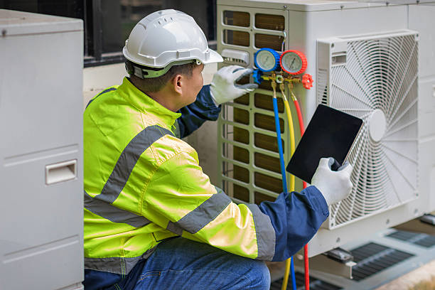 Professional Air Conditioning Repair technician working in Goshen, CA